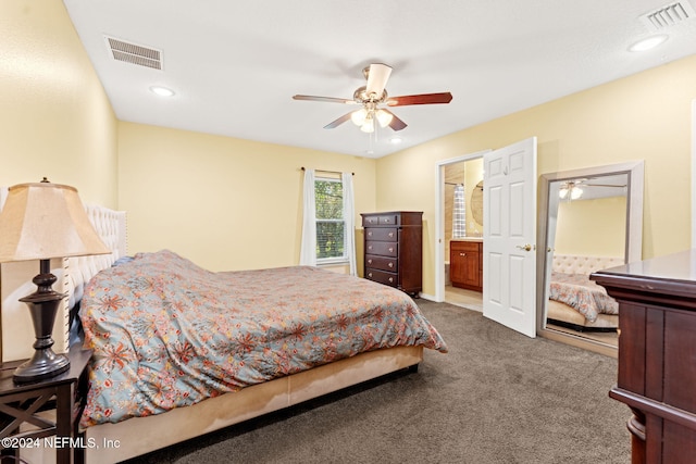 bedroom with ceiling fan, carpet, and ensuite bathroom