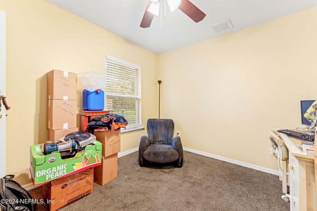 recreation room with carpet floors and ceiling fan