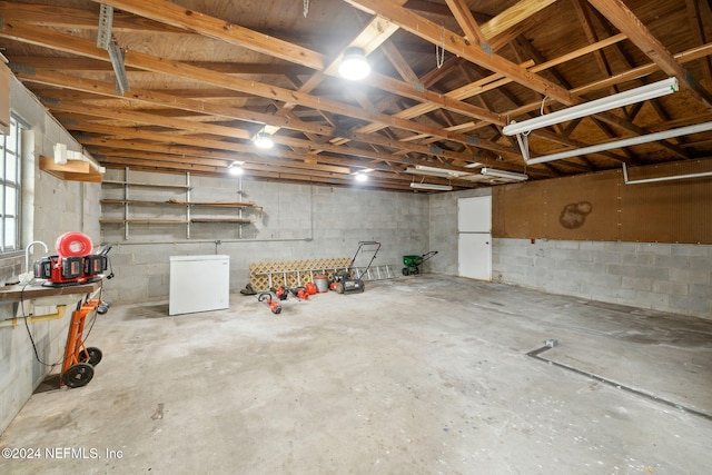 garage featuring fridge