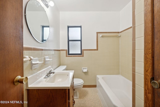 full bathroom with tile walls, separate shower and tub, vanity, tile patterned flooring, and toilet