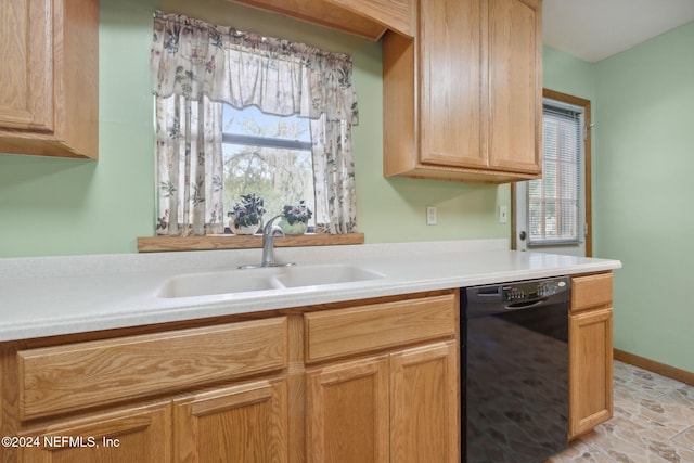 kitchen featuring sink and black dishwasher