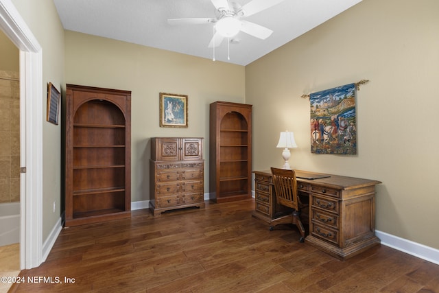 office with dark hardwood / wood-style floors and ceiling fan