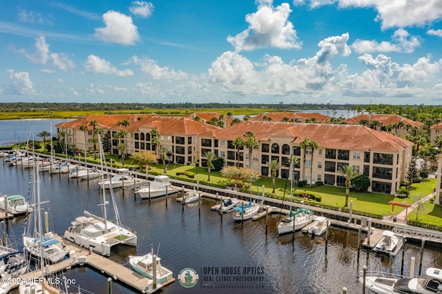 property view of water featuring a boat dock