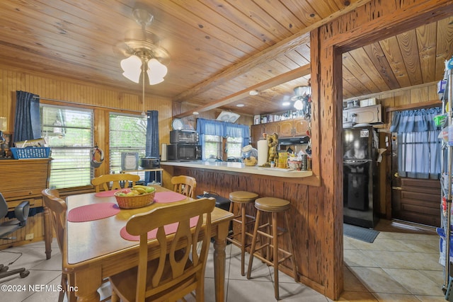 521 State Rd 207, East Palatka, FL 32131 - dining area featuring wooden walls, light tile patterned flooring, and wood ceiling