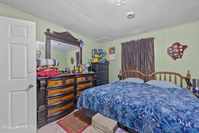 bedroom featuring light tile patterned floors