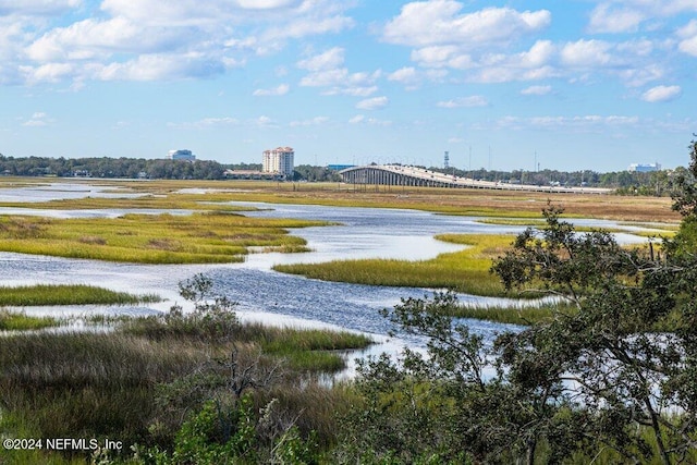 view of community with a water view