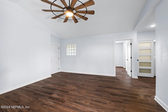 unfurnished room featuring ceiling fan, dark wood-type flooring, and vaulted ceiling