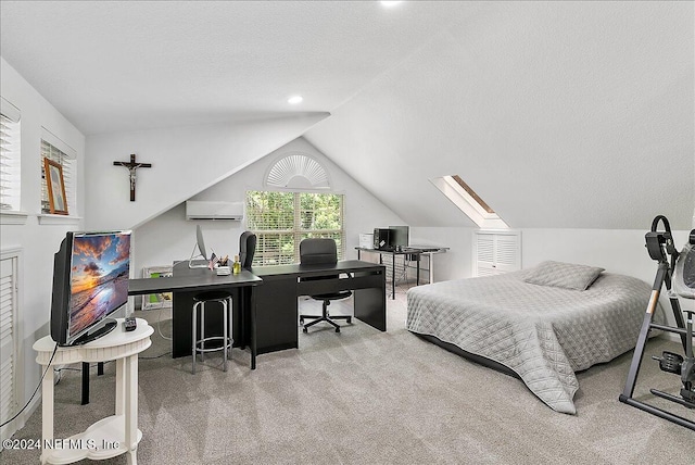 carpeted bedroom with a wall mounted AC, a textured ceiling, and vaulted ceiling