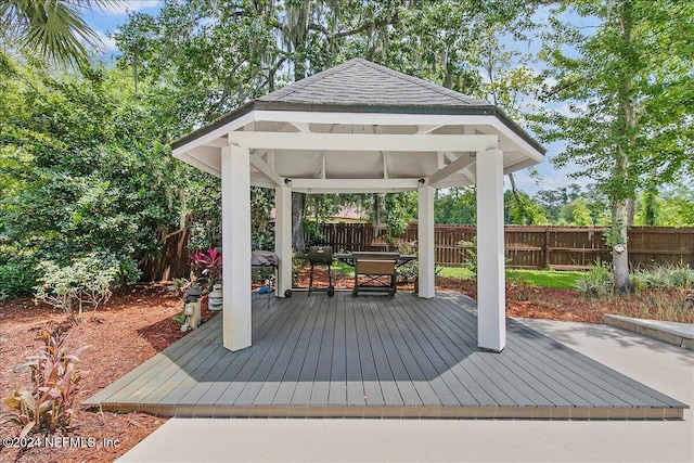 wooden deck featuring a gazebo