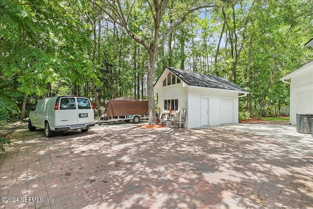 exterior space with central air condition unit