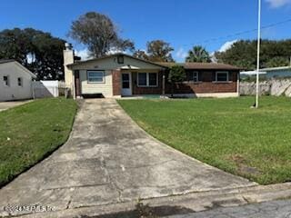 view of front of home with a front lawn