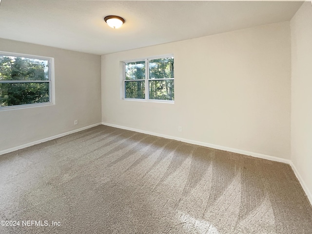 5225 Royce Ave, Jacksonville, FL 32205 - carpeted spare room with healthy amount of natural light and baseboards