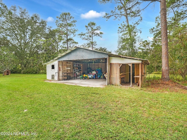 garage with a lawn