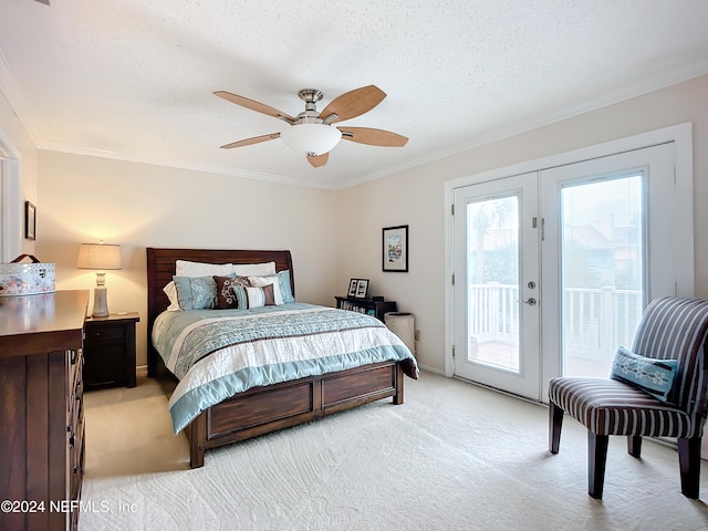 carpeted bedroom with french doors, crown molding, a textured ceiling, access to exterior, and ceiling fan