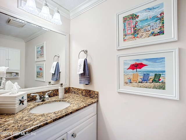 bathroom featuring vanity and crown molding