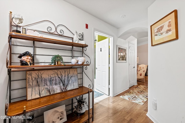 hallway featuring light wood-type flooring