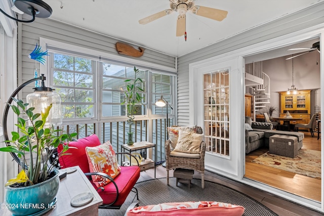 sunroom / solarium with ceiling fan