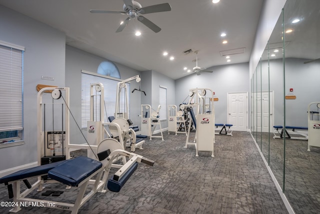 workout area with ceiling fan and dark carpet