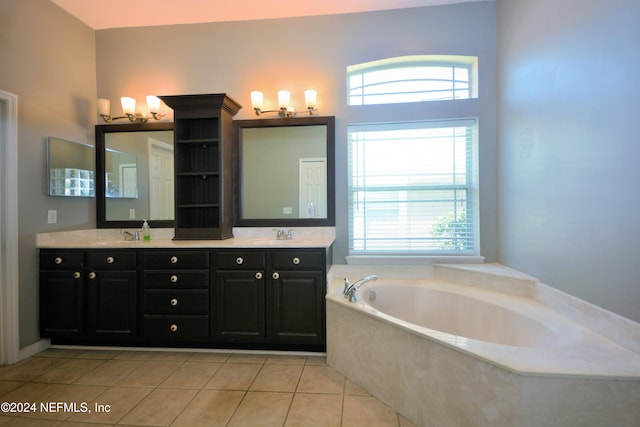 bathroom with vanity, tile patterned floors, and a bathing tub