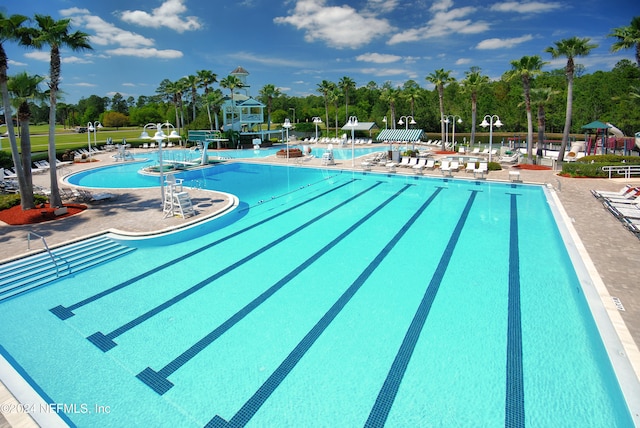 view of swimming pool featuring a patio