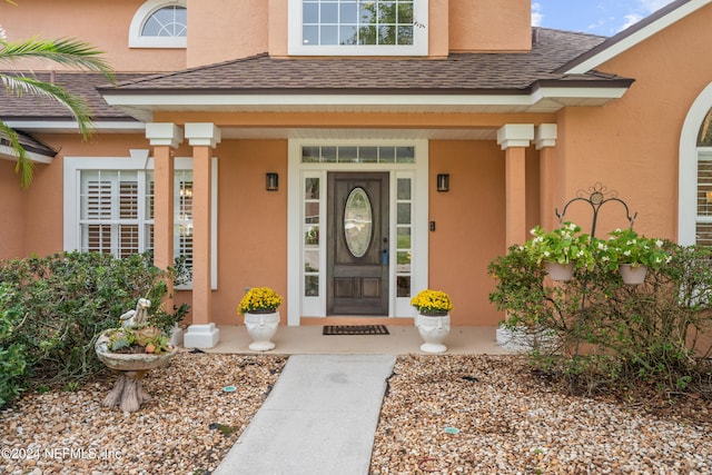 property entrance with covered porch