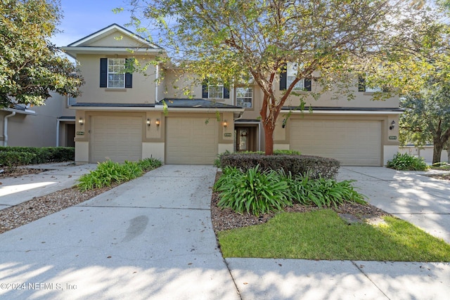 view of property featuring a garage