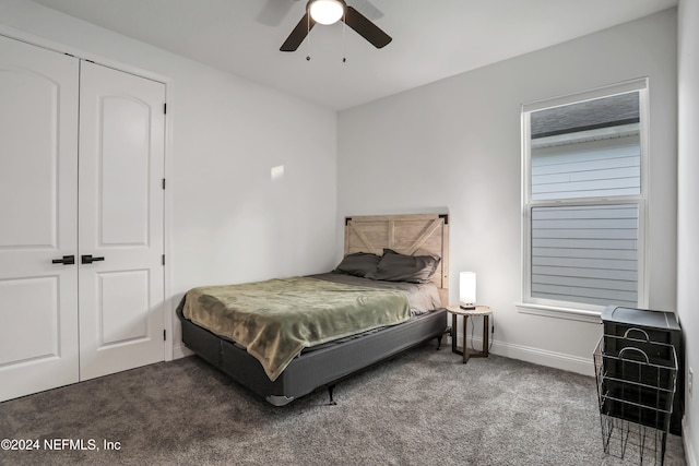 bedroom featuring dark colored carpet, billiards, ceiling fan, and a closet