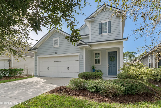 view of front of home with a garage