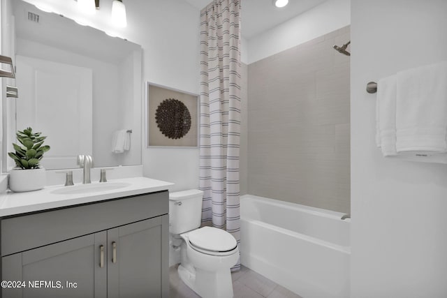 full bathroom with tile patterned flooring, vanity, toilet, and shower / tub combo with curtain