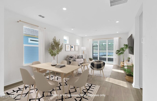 315 Fairlake Cir, Saint Augustine, FL 32092 - dining space with wood finished floors, healthy amount of natural light, recessed lighting, and baseboards