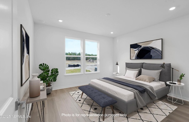 315 Fairlake Cir, Saint Augustine, FL 32092 - bedroom with wood finished floors, recessed lighting, and baseboards
