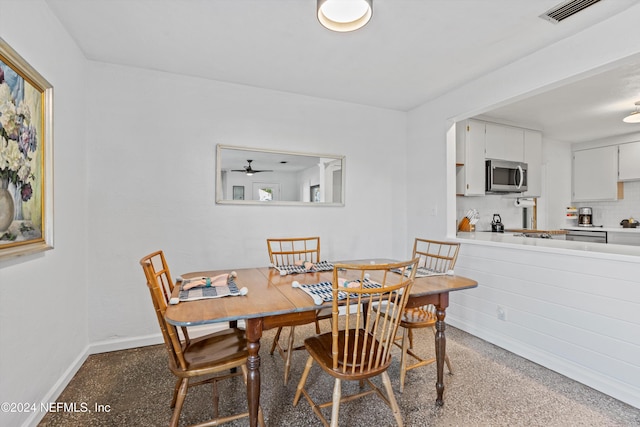 dining area with ceiling fan