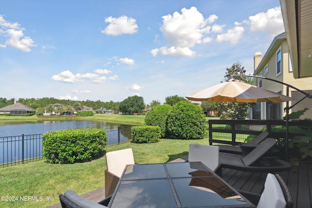 view of patio with a water view