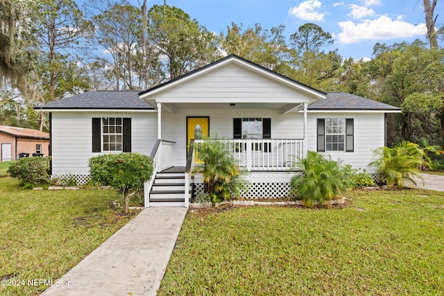 view of front of property with a front lawn and a porch