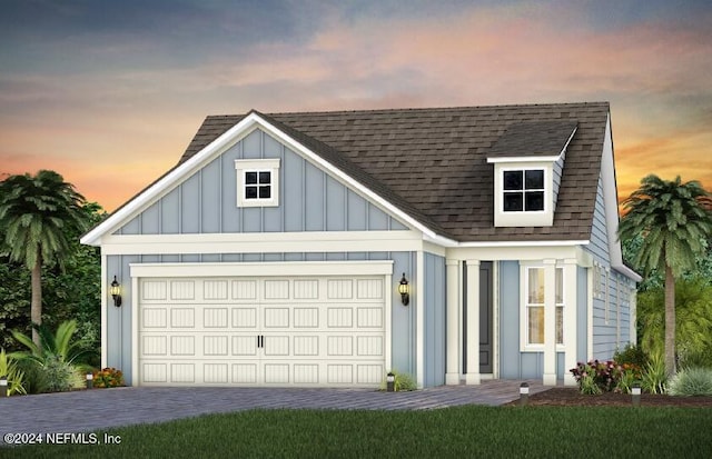 view of front of home with a garage