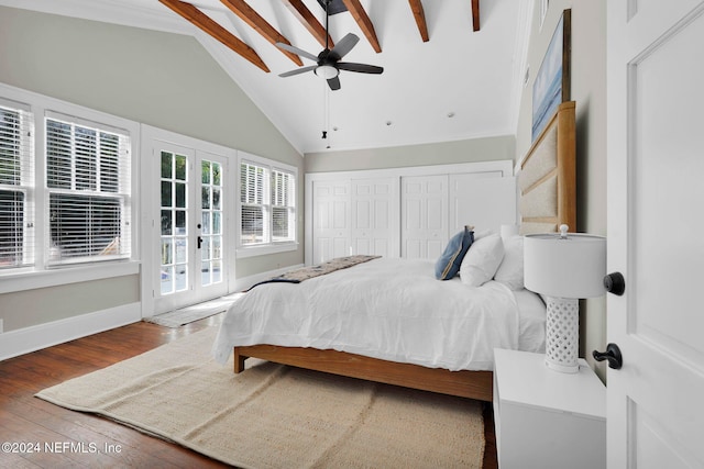 bedroom with french doors, hardwood / wood-style flooring, ceiling fan, and high vaulted ceiling