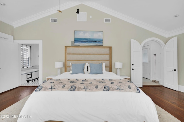 bedroom with ornamental molding, dark hardwood / wood-style floors, and vaulted ceiling