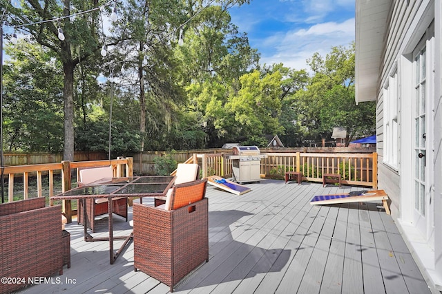 deck with an outdoor fire pit