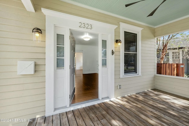 wooden deck with ceiling fan