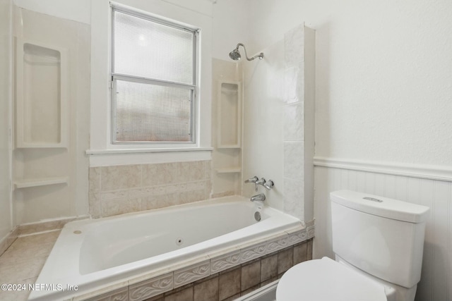 bathroom with toilet and shower / bathtub combination