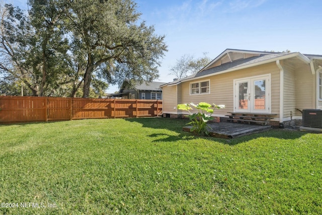 view of yard with central AC