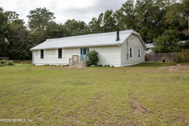 view of front of house with a front yard