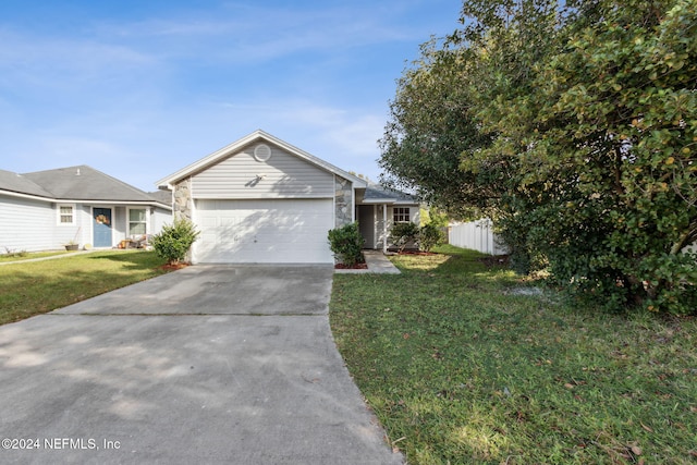 single story home with a garage and a front yard