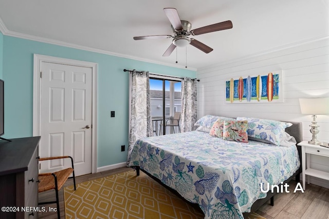 bedroom with ceiling fan, ornamental molding, and hardwood / wood-style floors