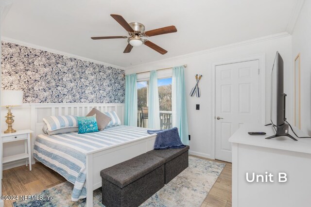 bedroom with ornamental molding, ceiling fan, and light hardwood / wood-style flooring