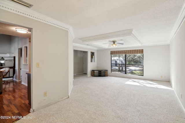 living room with ceiling fan, a textured ceiling, dark colored carpet, and crown molding