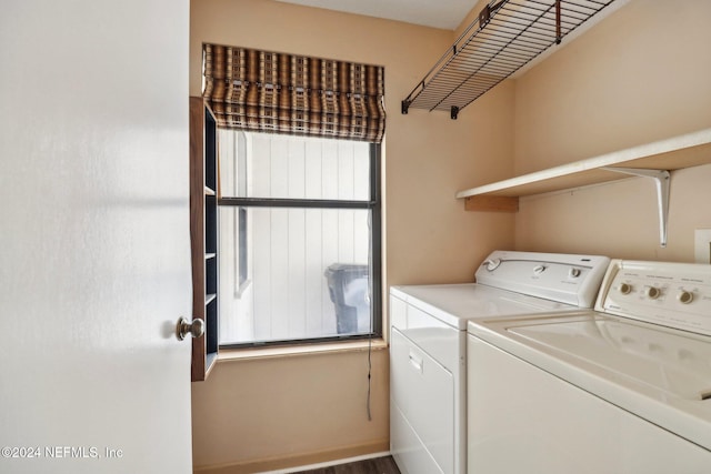 laundry room featuring separate washer and dryer