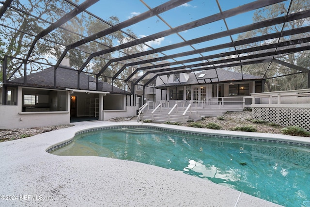 view of pool featuring a lanai and a patio area