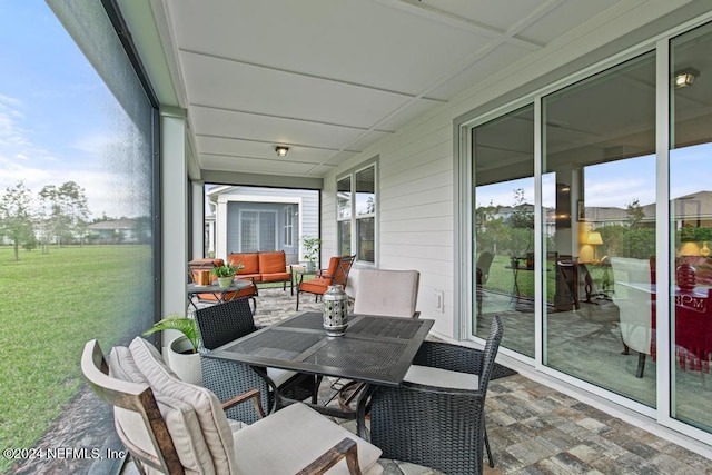 sunroom / solarium with a wealth of natural light