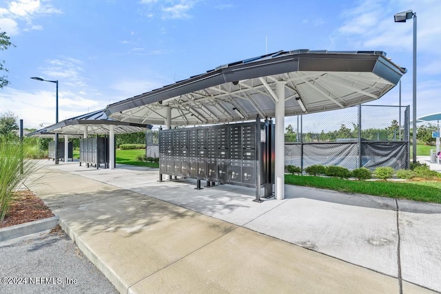 surrounding community with a gazebo and mail boxes